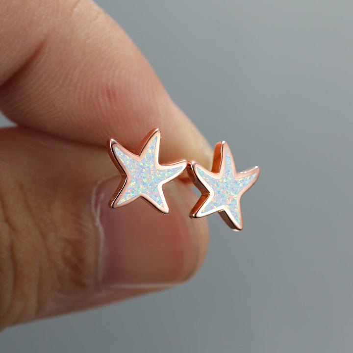 Ohrringe in Sternform, Roségold, Opal-Effekt, Damen-Schmuck, modisch, elegant, Geschenkidee.
