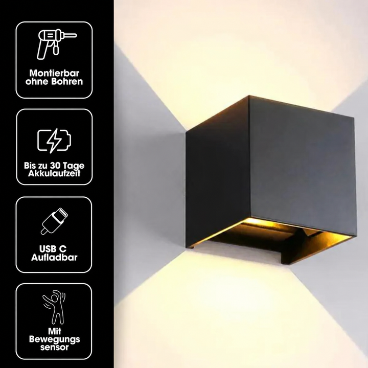 Sort kubelampe med ikoner, der viser montering uden boring, op til 30 dages batteritid, USB-C-opladning og bevægelsessensor. 18