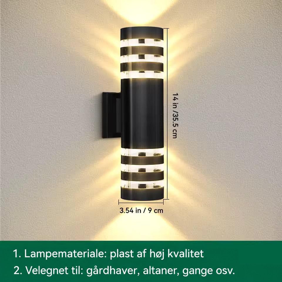 Længere cylinderlampe med tre lysbånd i hver ende, vist med målangivelser for højde og diameter 15