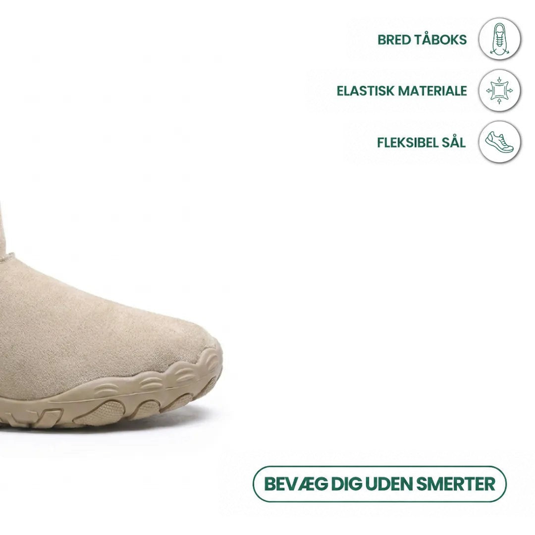 Tæt på den brede tå på beige støvle med grafik om fleksibel sål 5