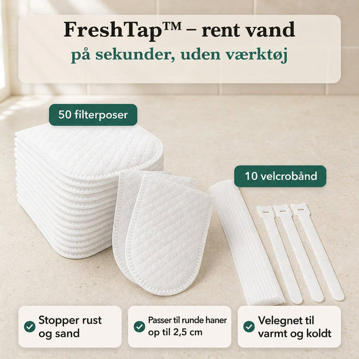 Stak af hvide filterposer med to løse poser foran og tre hvide velcrobånd på en lys bordplade. 1
