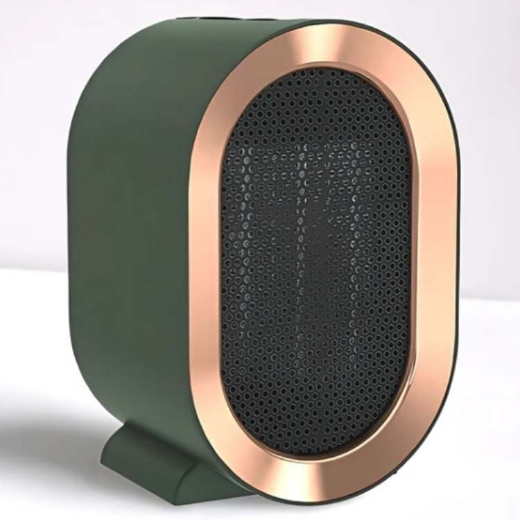 Grøn varmeapparat med kobberfarvet oval kant og sort gitter set skråt forfra mod hvid baggrund 7